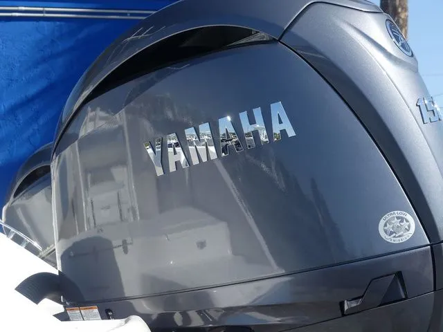 Slide: The Image of Yamaha outboard motor on a 2026 Robalo R180 Center Console boat. - 9