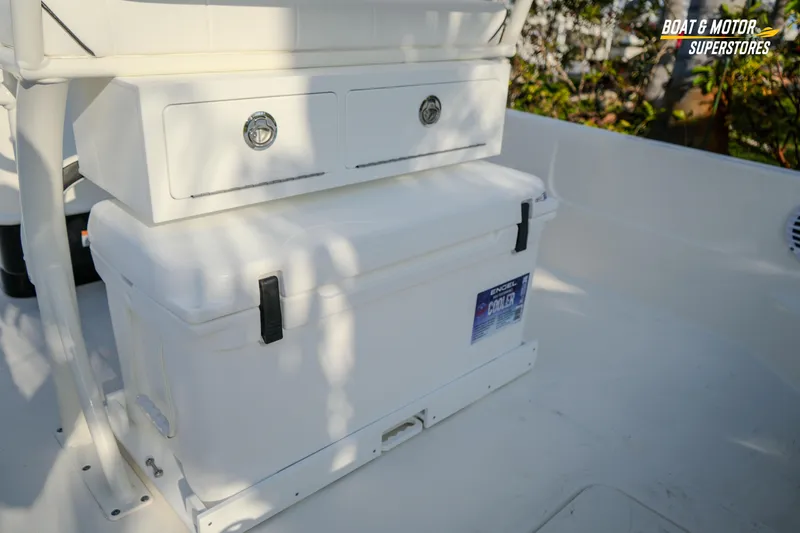 Slide: The Image of 2026 Skeeter SX230 boat interior with storage drawers and Engel cooler. - 21