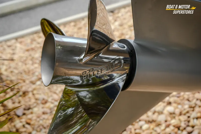 Slide: The Image of Chrome boat propeller detail on a 2026 Blackfin 272 DC, displayed at Boat & Motor Superstores. - 11