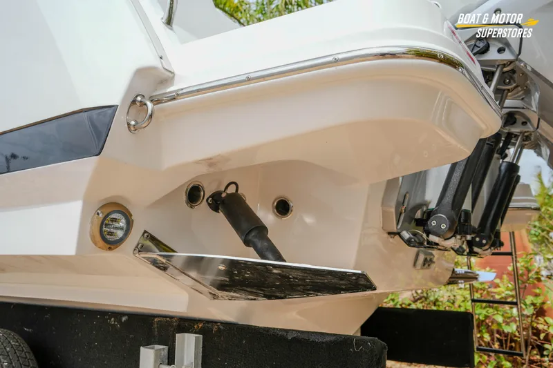 Slide: The Image of 2026 Blackfin 272 DC boat stern detail with motor and trim tabs. - 13