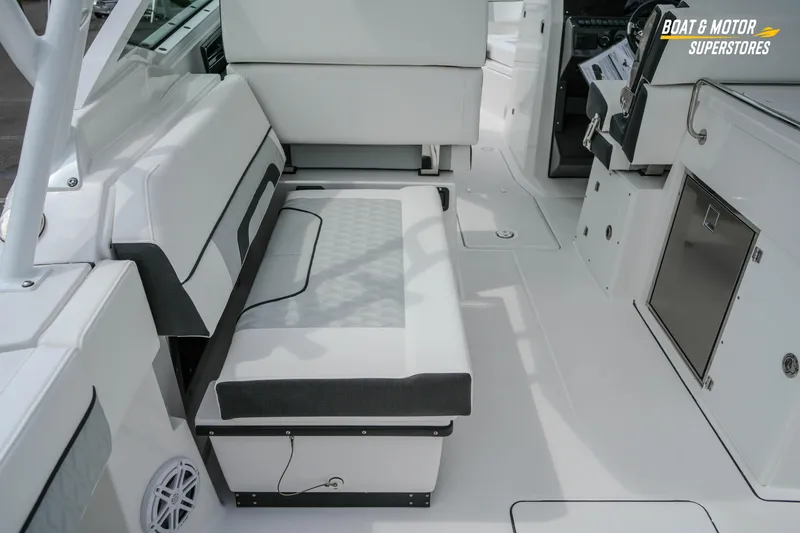 Slide: The Image of Interior of 2026 Blackfin 272 DC boat with white seating and modern design. - 19