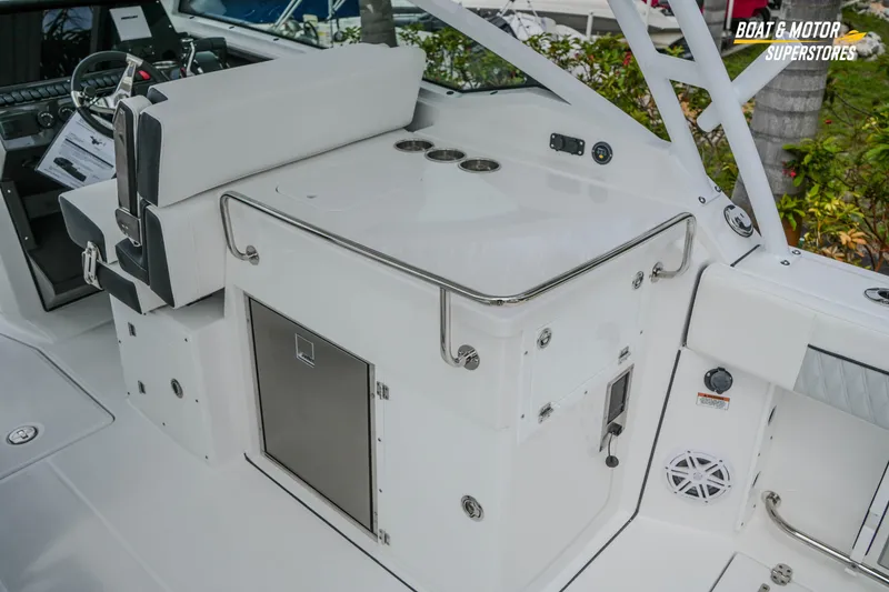 Slide: The Image of 2026 Blackfin 272 DC boat interior with seating and storage compartments. - 25