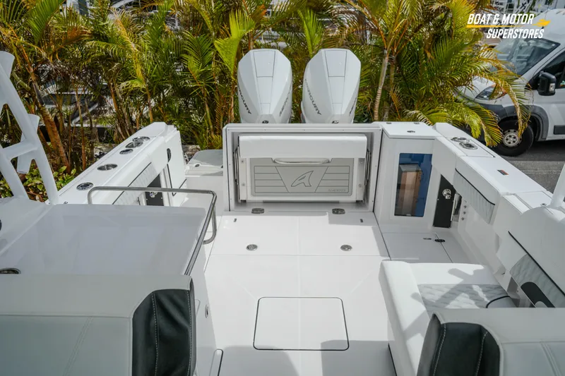 Slide: The Image of 2026 Blackfin 272 DC boat interior with dual engines and sleek design. - 43