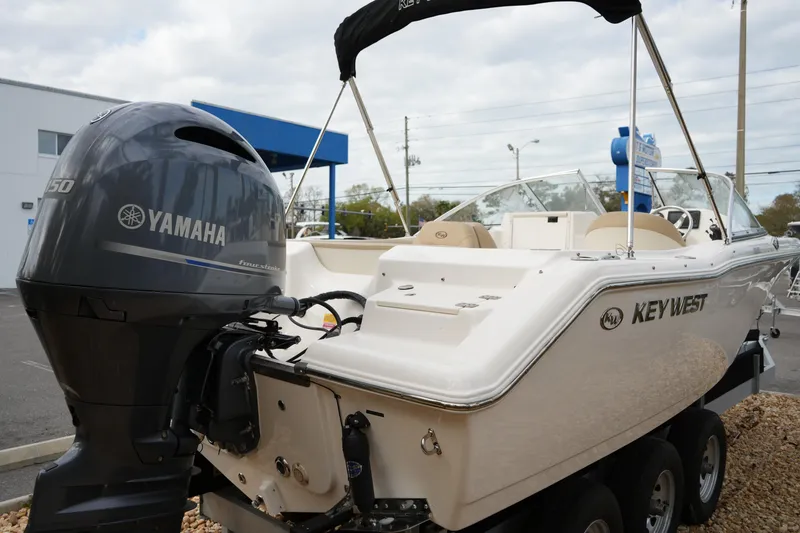 Slide: The Image of 2020 Key West 203 DFS boat with Yamaha engine, parked on a trailer. - 10