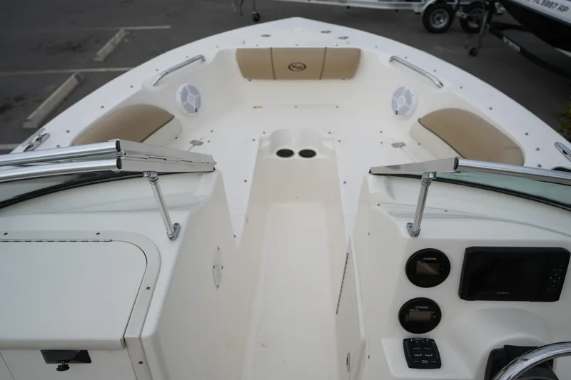 Slide: The Image of 2020 Key West 203 DFS boat interior with seating and dashboard controls. - 30