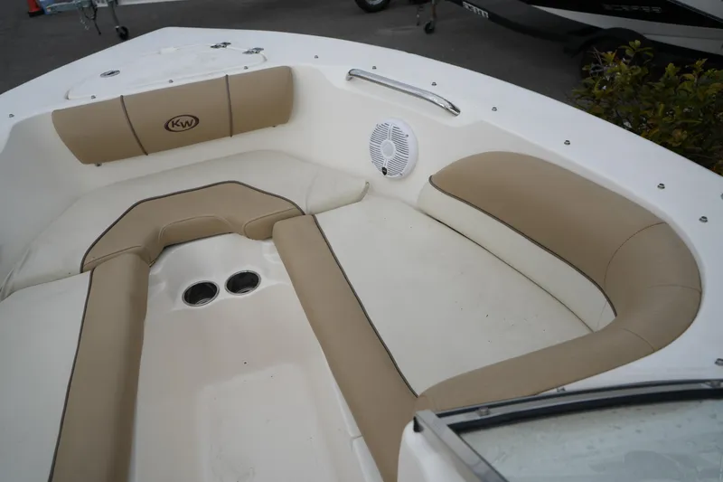 Slide: The Image of 2020 Key West 203 DFS boat interior with beige seating and speaker. - 41