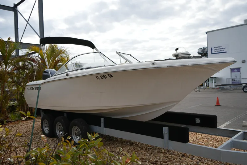 Slide: The Image of 2020 Key West 203 DFS boat on trailer, parked outdoors near service department. - 5