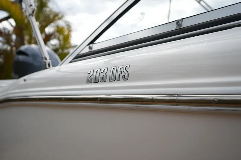 Slide: The Image of 2020 Key West 203 DFS boat side view with model name visible. - 6