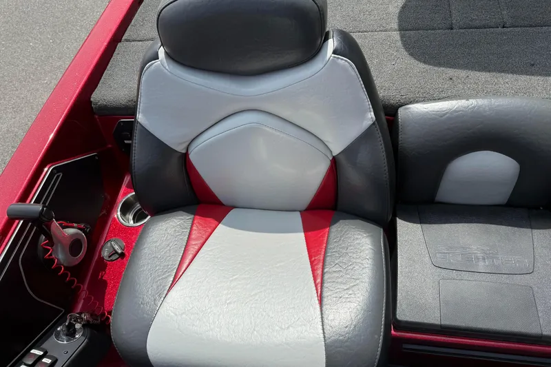 Slide: The Image of 2017 Skeeter ZX250 boat seat with red, gray, and white upholstery. - 11