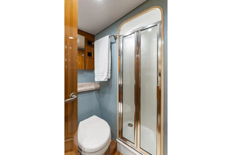 Slide: The Image of Bathroom interior of 2018 Viking 44 Express yacht with shower and toilet. - 105