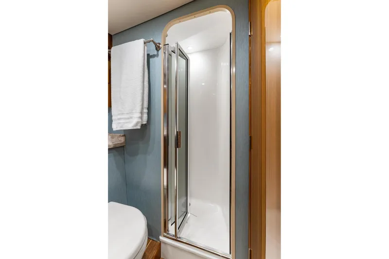 Slide: The Image of Bathroom shower in 2018 Viking 44 Express yacht, featuring sleek design and modern fixtures. - 106
