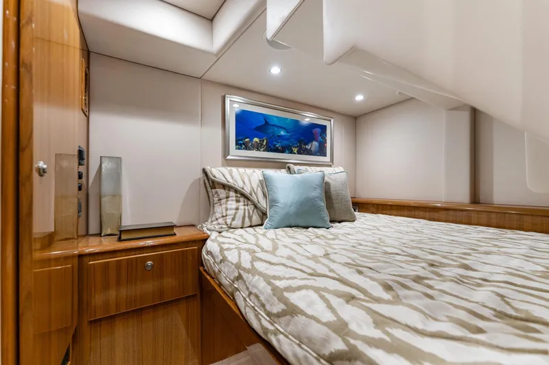 Slide: The Image of Luxurious cabin interior of 2018 Viking 44 Express yacht with cozy bedding and elegant decor. - 107