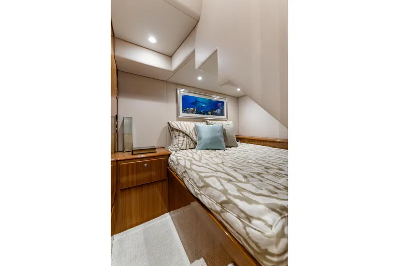 Slide: The Image of Luxurious cabin interior of 2018 Viking 44 Express yacht with elegant bedding and decor. - 108