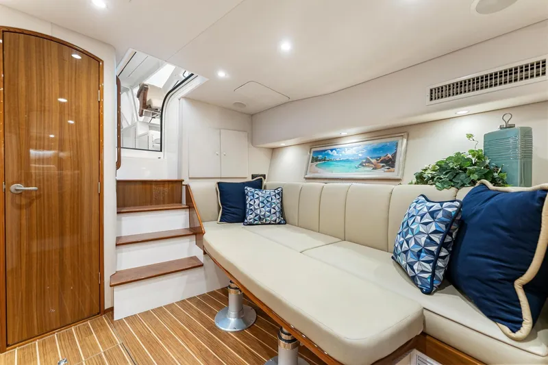 Slide: The Image of Luxurious interior of 2018 Viking 44 Express yacht with elegant seating and decor. - 112