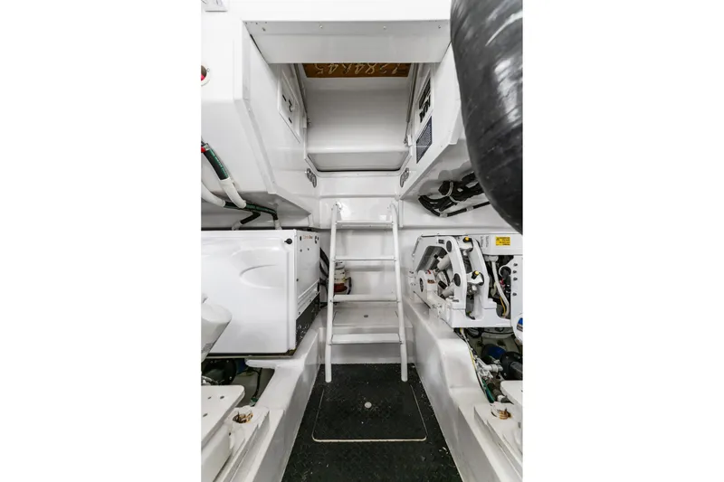 Slide: The Image of Engine room of 2018 Viking 44 Open yacht with ladder and equipment. - 105