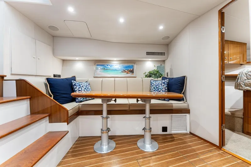 Slide: The Image of Luxurious interior of 2018 Viking 44 Express yacht with elegant seating and wooden finishes. - 3