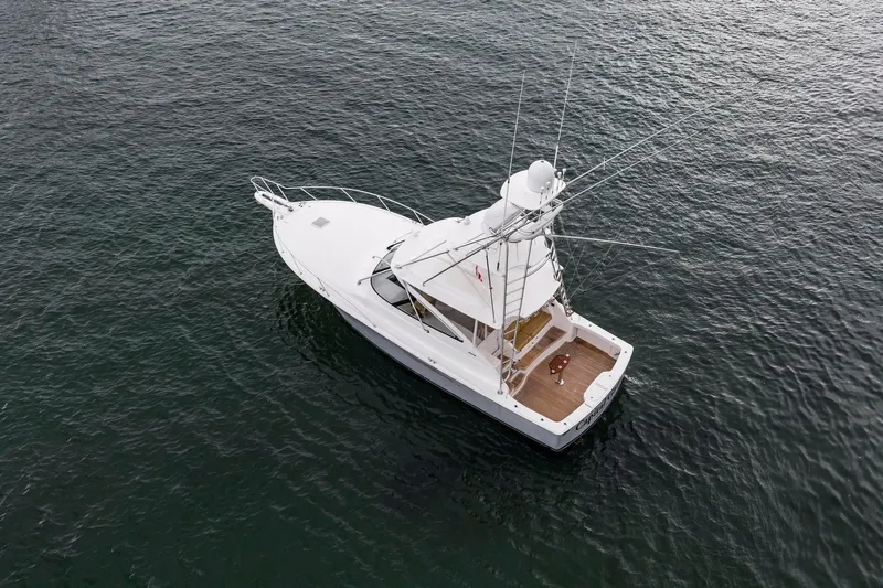 Slide: The Image of 2018 Viking 44 Express yacht on open water, aerial view. - 39