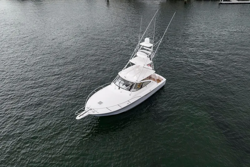Slide: The Image of 2018 Viking 44 Express yacht on calm water, aerial view. - 41