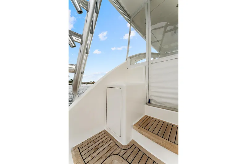Slide: The Image of 2018 Viking 44 Express yacht with teak steps and sleek design. - 56