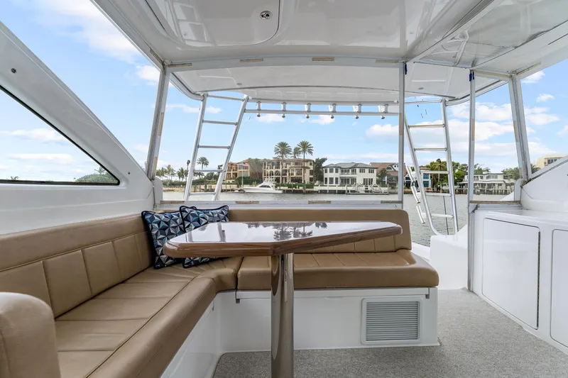 Slide: The Image of Interior of 2018 Viking 44 Express yacht with seating and waterfront view. - 65