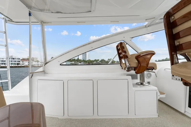 Slide: The Image of 2018 Viking 44 Express yacht interior with sleek seating and ocean view. - 75