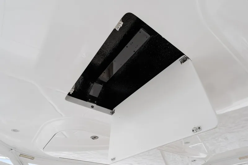 Slide: The Image of Open hatch on 2018 Viking 44 Express yacht ceiling, showcasing sleek design. - 76