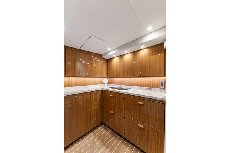 Slide: The Image of Luxurious wooden interior of 2018 Viking 44 Express yacht kitchen. - 95