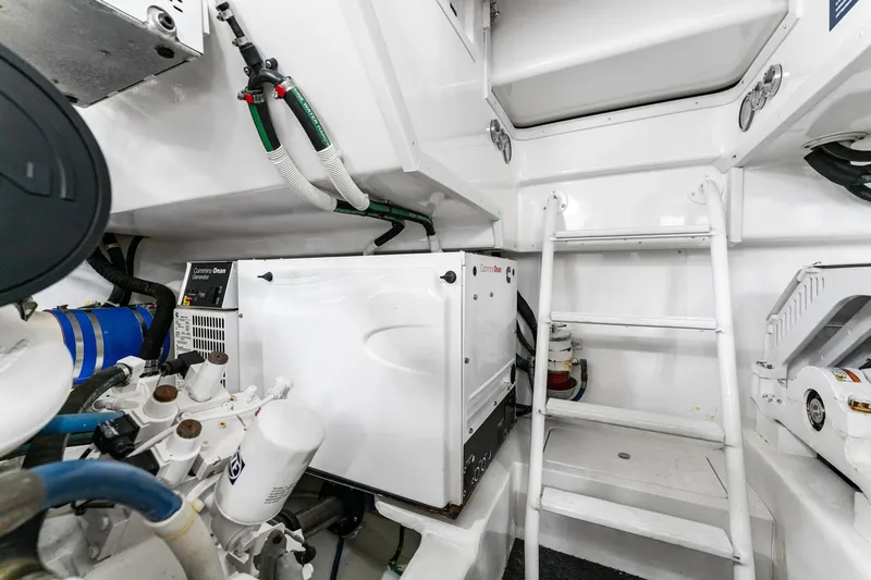 Slide: The Image of Engine room of 2018 Viking 44 Open yacht with Cummins Onan generator. - 104