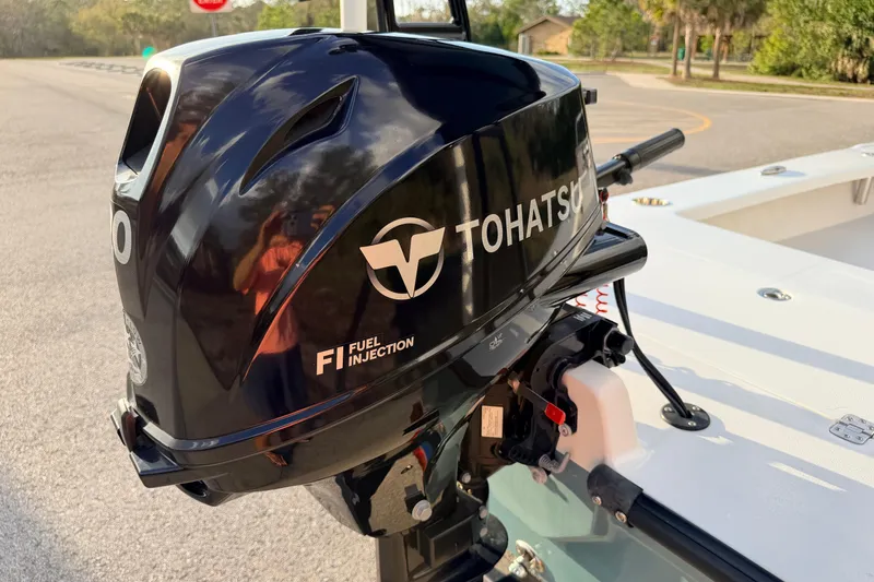 Slide: The Image of Tohatsu outboard motor on 2023 Dorado 16 Skiff boat, featuring fuel injection technology. - 20