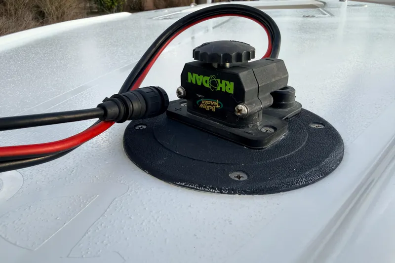 Slide: The Image of Close-up of a 2023 Dorado 16 Skiff boat's electrical connection on deck. - 33