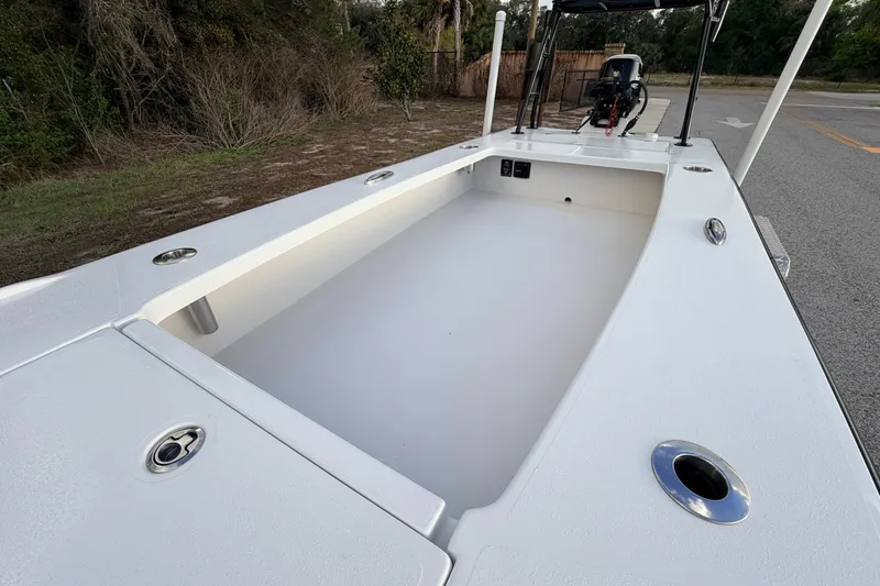 Slide: The Image of 2023 Dorado 16 Skiff boat interior with spacious deck and sleek design. - 34