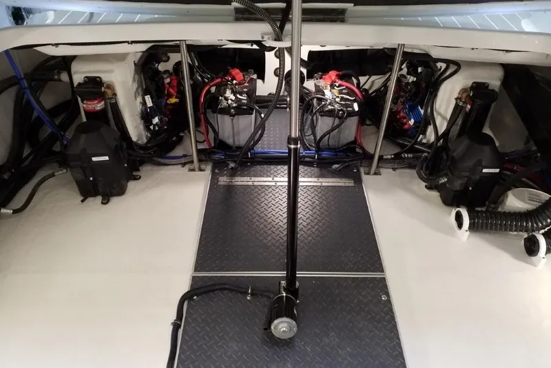 Slide: The Image of Engine compartment of a 2020 Formula 310 Bowrider OB, showcasing wiring and components. - 10