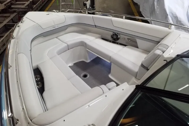 Slide: The Image of 2020 Formula 310 Bowrider OB interior with white seating and modern design. - 17