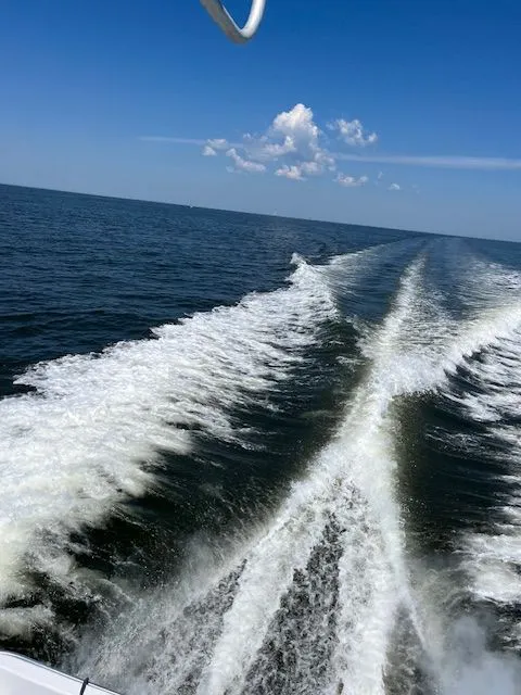 Slide: The Image of Wake of a 1998 Mainship Sedan Bridge on open sea. - 8