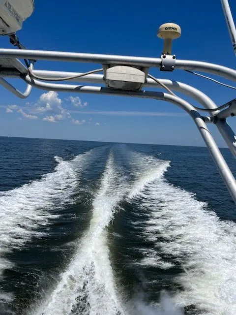 Slide: The Image of Wake of a 1998 Mainship Sedan Bridge on open sea. - 9
