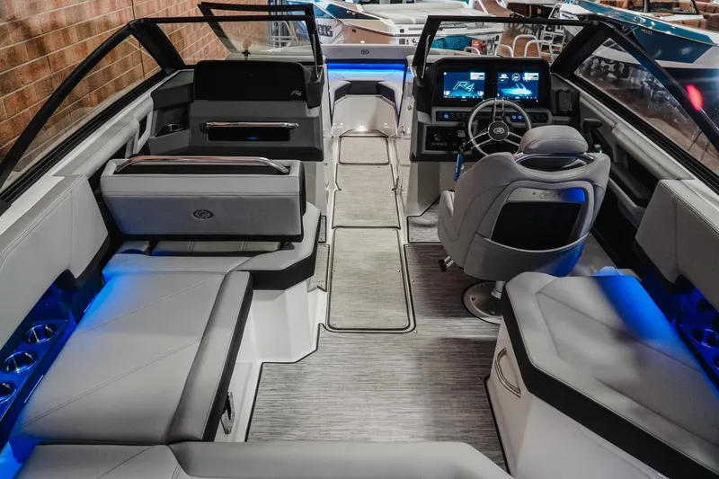 Slide: The Image of Luxurious interior of 2026 Cobalt R4 boat with modern seating and advanced dashboard. - 10