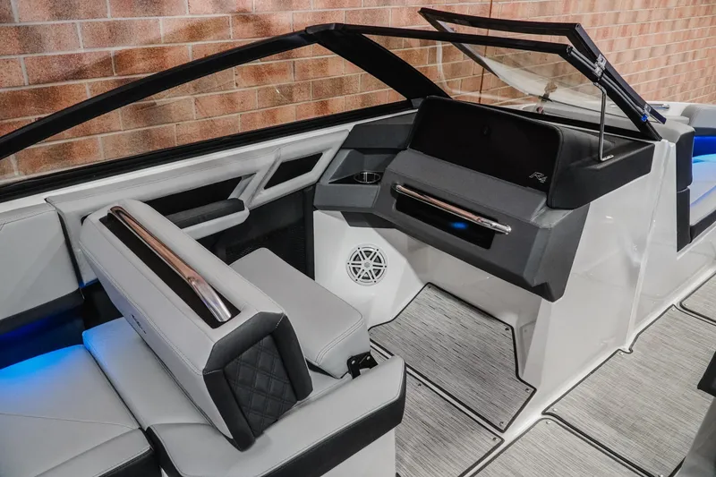 Slide: The Image of Luxurious interior of 2026 Cobalt R4 boat with modern seating and sleek dashboard design. - 16