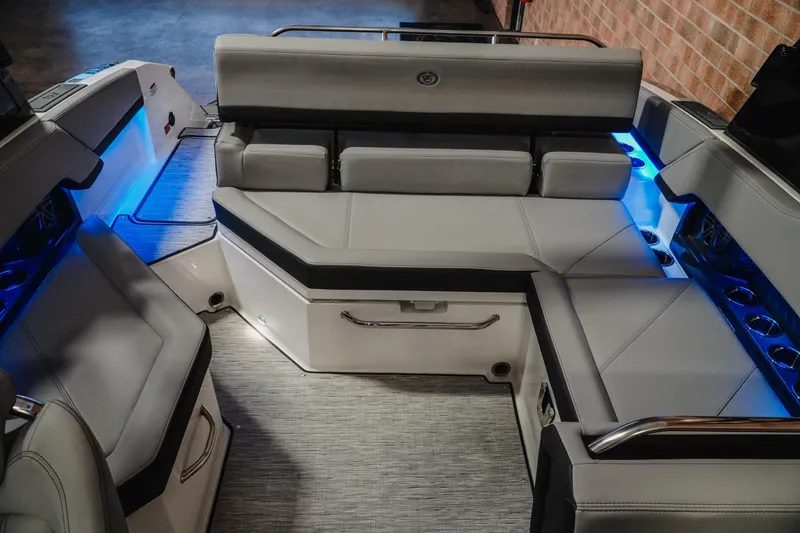 Slide: The Image of Luxurious seating area on a 2026 Cobalt R4 boat with ambient blue lighting. - 20