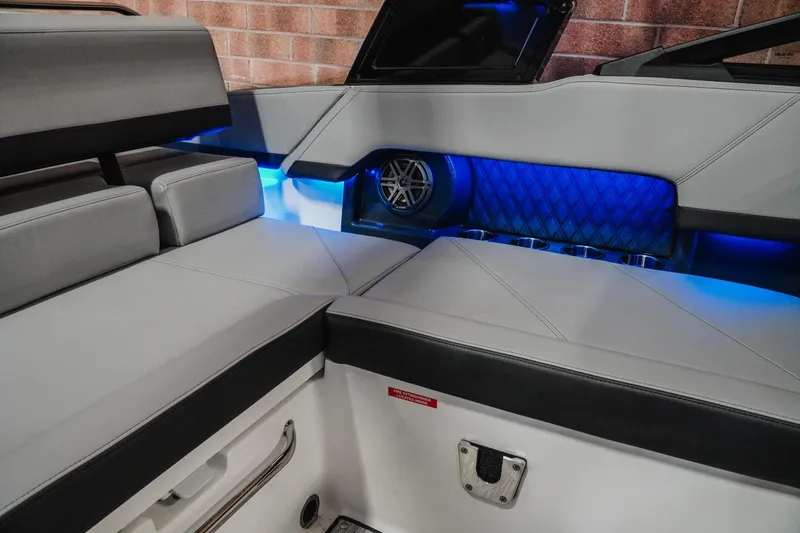 Slide: The Image of Luxurious interior of 2026 Cobalt R4 boat with blue LED lighting and premium seating. - 21