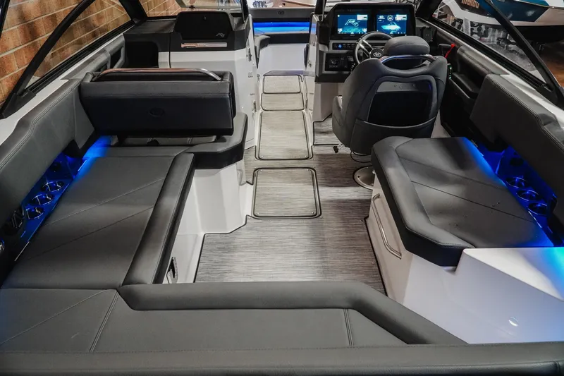 Slide: The Image of Luxurious interior of 2026 Cobalt R6 boat with modern seating and ambient lighting. - 10