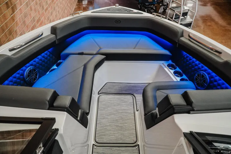 Slide: The Image of 2026 Cobalt R6 boat interior with blue LED lighting and luxurious seating. - 18