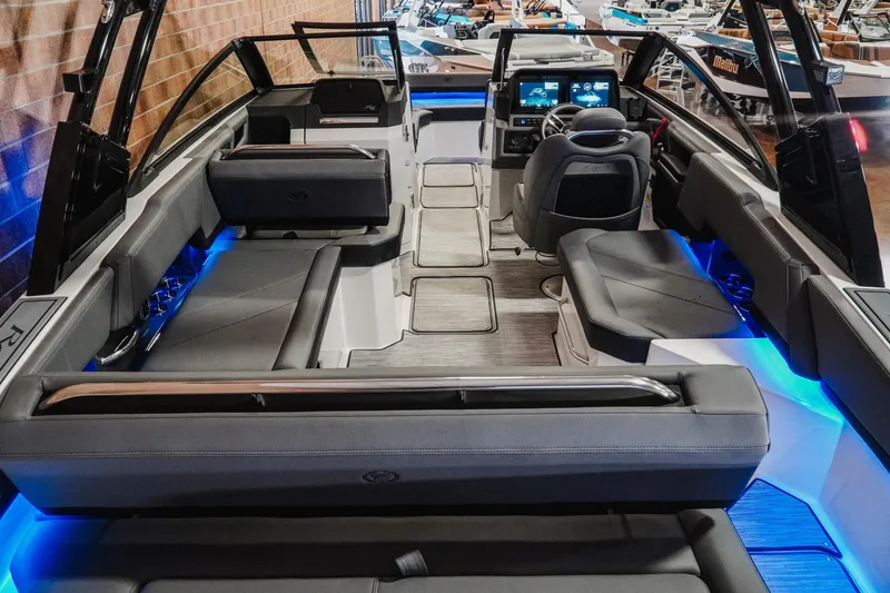 Slide: The Image of Luxurious interior of 2026 Cobalt R6 boat with modern seating and ambient lighting. - 9