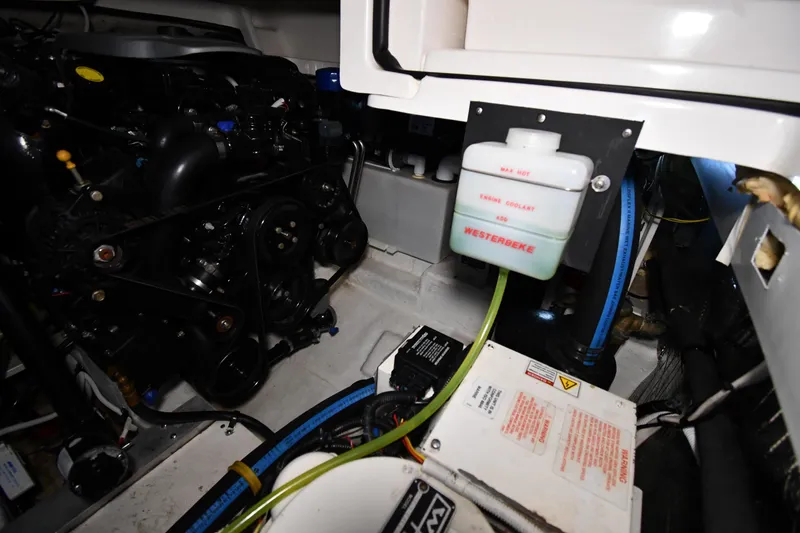 Slide: The Image of Engine compartment of 2014 Chaparral 327 SSX with Westerbeke coolant system. - 38