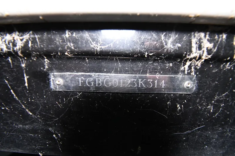 Slide: The Image of 2014 Chaparral 327 SSX boat hull identification number plate. - 47