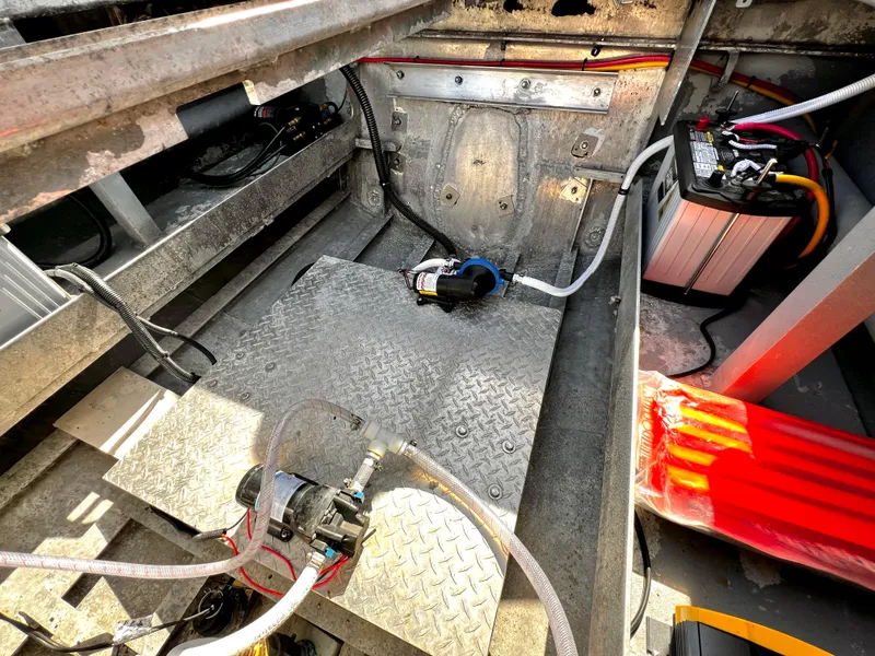 Slide: The Image of Interior view of ACB 30 model (2003) showing battery and wiring setup. - 16