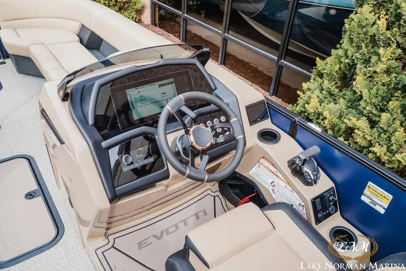 Slide: The Image of Luxurious 2026 Evotti 725QL boat interior with modern dashboard and comfortable seating. - 11