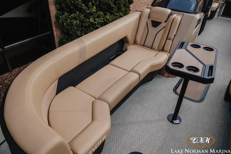 Slide: The Image of Luxurious Evotti 725QL boat seating with table, 2026 model, at Lake Norman Marina. - 14