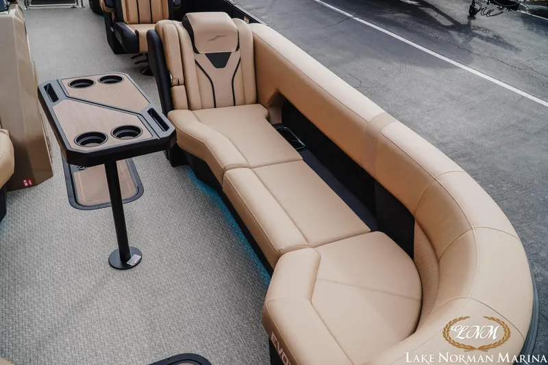 Slide: The Image of Luxurious interior of 2026 Evotti 725QL boat with beige seating and table. - 15