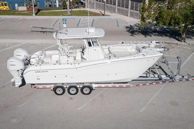 The Image of 2024 World Cat 295 CC boat on trailer in parking lot. - 12