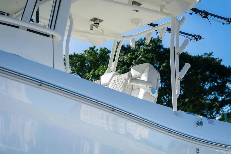 Slide: The Image of 2024 World Cat 295 CC boat with sleek design and comfortable seating. - 22